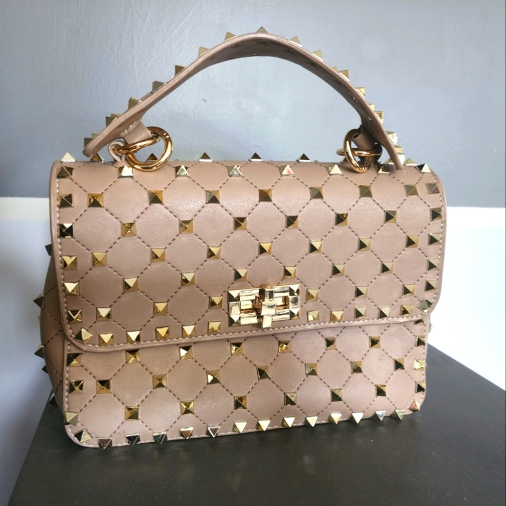 Beige studded hand bag